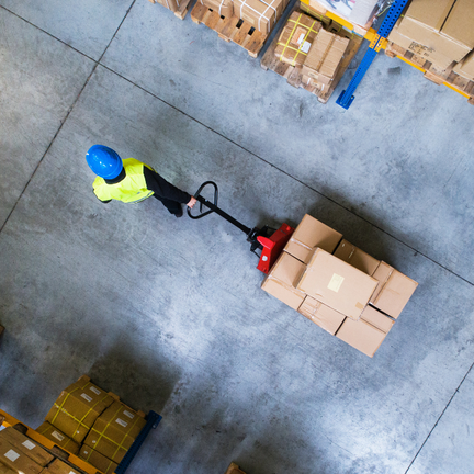 Fulfillment Company worker carrying boxes